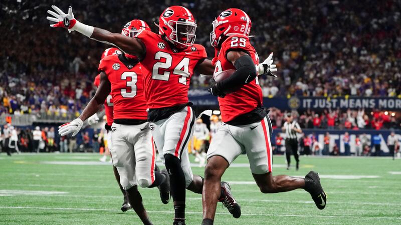 Georgia defensive back Malaki Starks (24) reacts as Georgia defensive back Christopher Smith...
