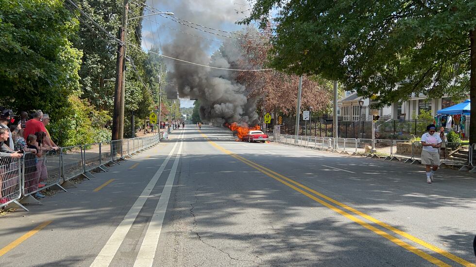 Car on fire along 10th Street where Atlanta Pride Parade is underway