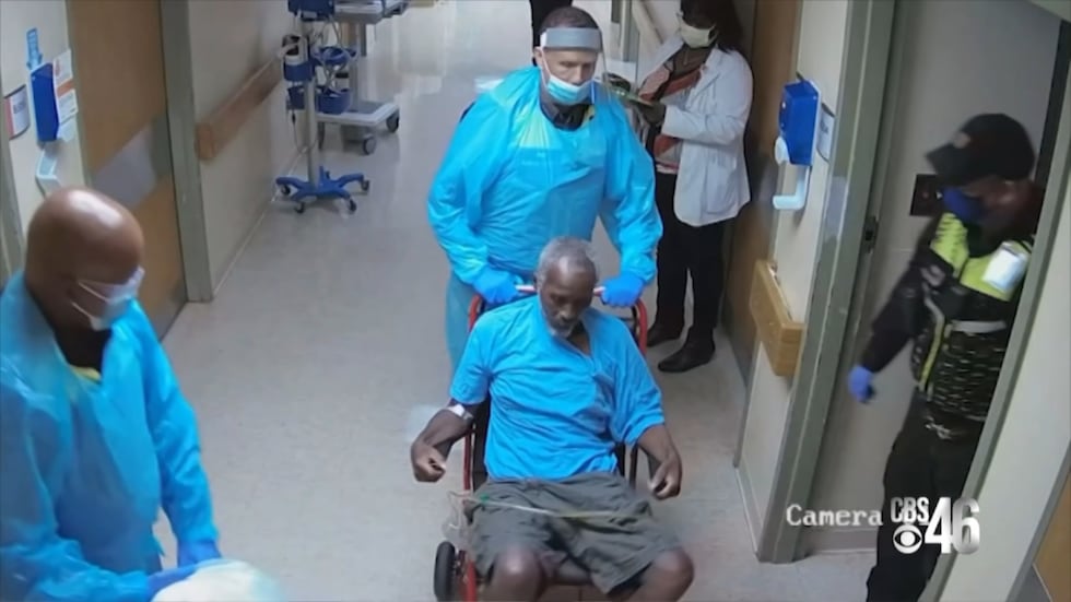 Medical Professionals are seen in surveillance video wheeling Jerry out of his hospital room.