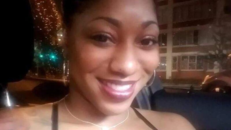 victim in car dealership homicide
