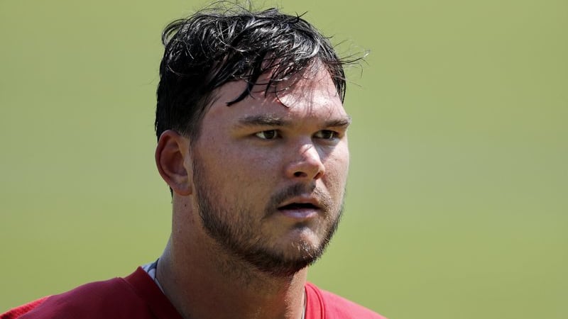 Atlanta Falcons offensive tackle Jake Matthews walks off the field following practice at NFL...