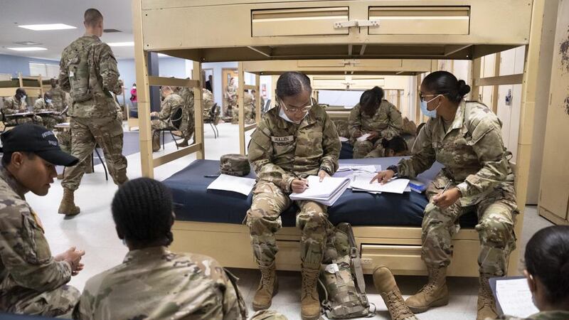 Students enlisted in the new Army prep course work together in barracks at Fort Jackson in...