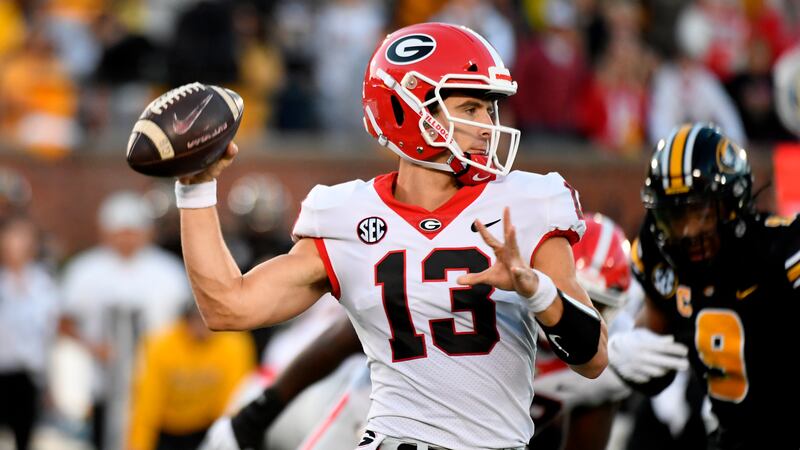 Georgia quarterback Stetson Bennett throws during the first half of an NCAA college football...