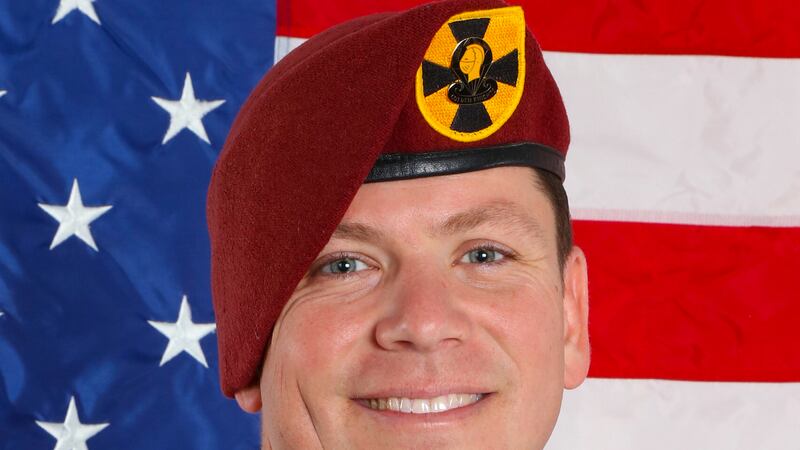 This photo provided by the U.S. Army Parachute Team shows Sgt. 1st Class Michael Ty...