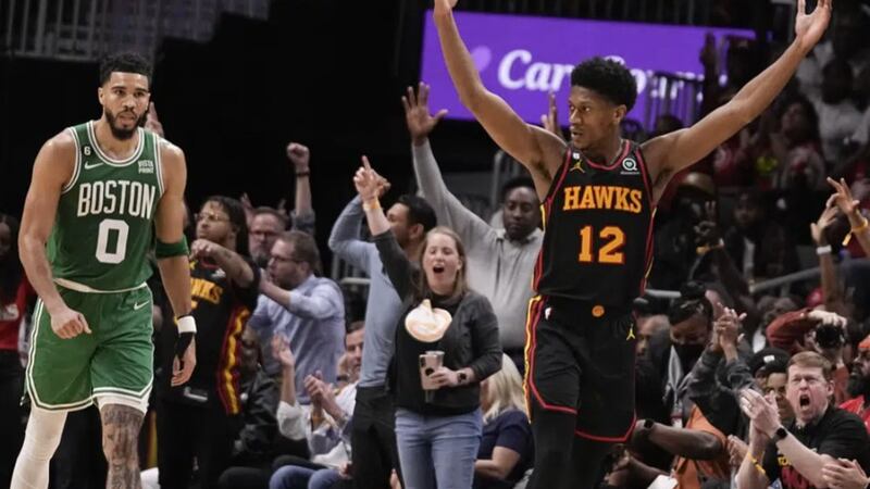 Atlanta Hawks forward Onyeka Okongwu (17) and Atlanta Hawks guard Trae Young (11) during the...