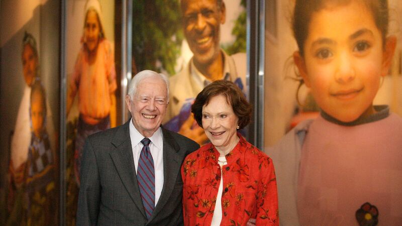 FILE - In this Sept. 28, 2009, file photo former President Jimmy Carter and his wife Rosalynn...