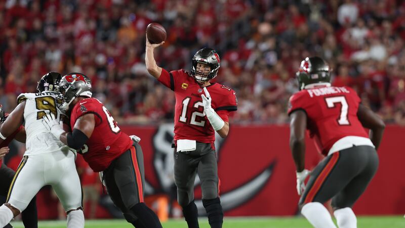 Tampa Bay Buccaneers quarterback Tom Brady (12) passes in the first half of an NFL football...