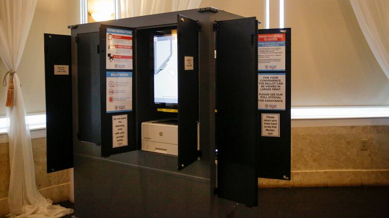 FILE - New state-issued voting machines used for the Georgia primary election on June 9, 2020,...