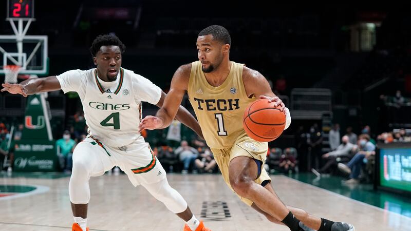 FILE - Georgia Tech guard Kyle Sturdivant (1) drives past Miami guard Bensley Joseph during...