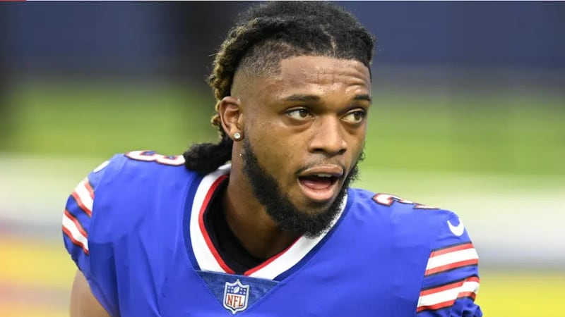 FILE - Buffalo Bills Damar Hamlin with his helmet off.