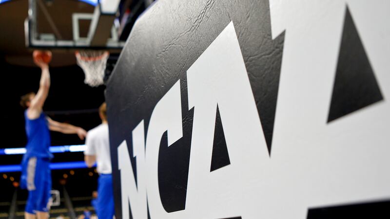 Duke's Antonio Vrankovic, left, shoots during practice for an NCAA college basketball first...