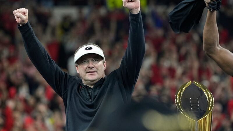 Georgia head coach Kirby Smart celebrates after the College Football Playoff championship...