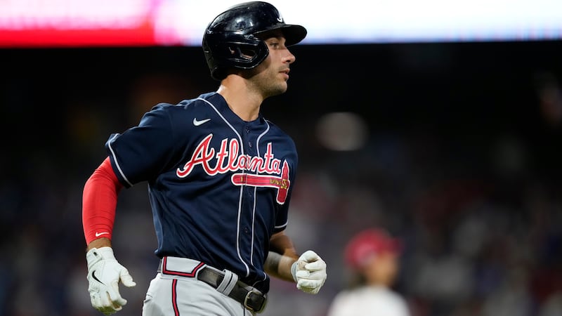 Atlanta Braves' Matt Olson rounds the bases after hitting a home run against Philadelphia...