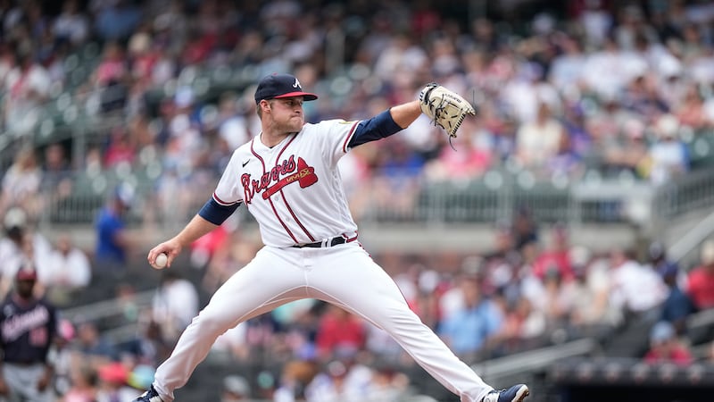 Atlanta Braves starting pitcher Bryce Elder delivers in the first inning of a baseball game...